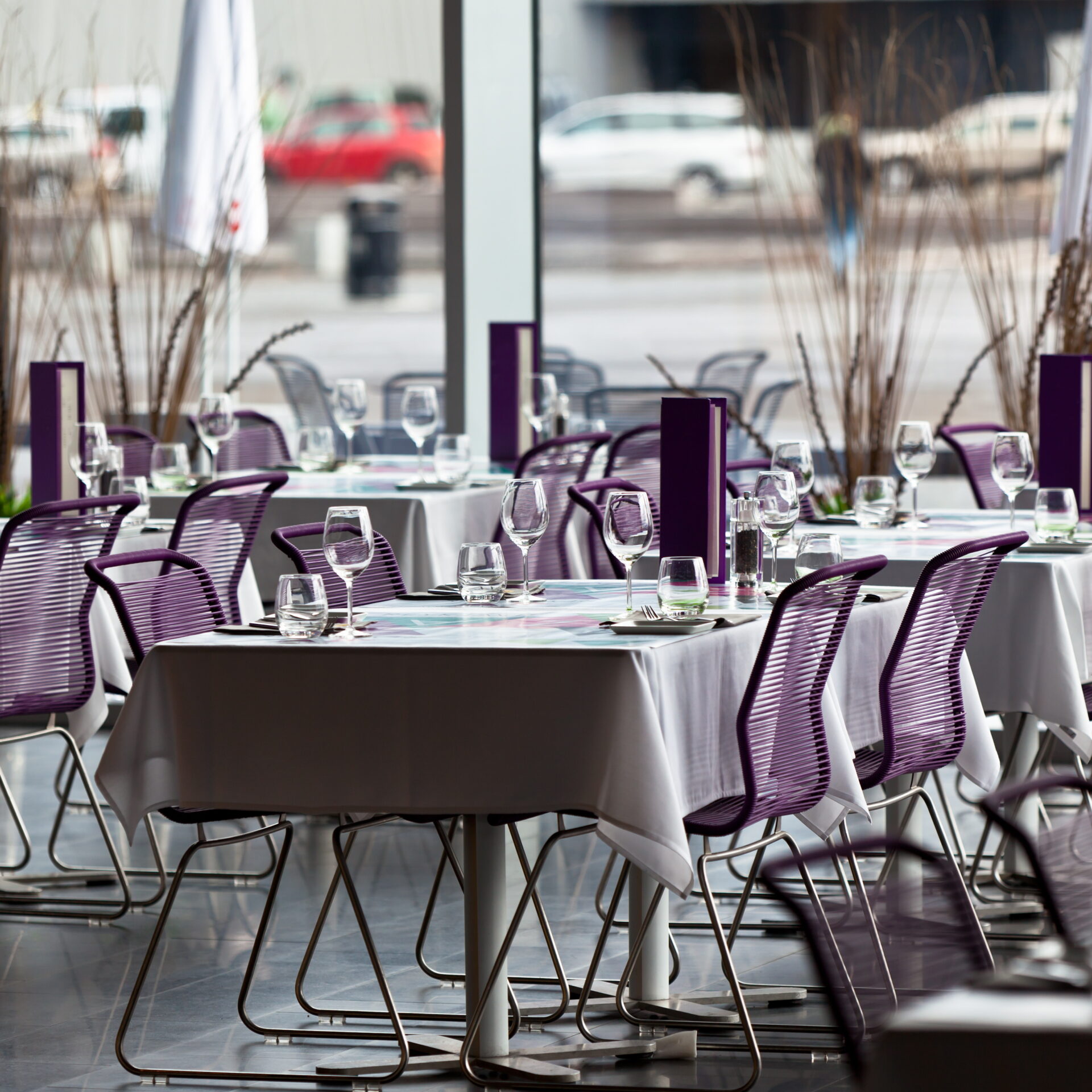 Indoor restaurant tables ready for service. Small GRIP shot