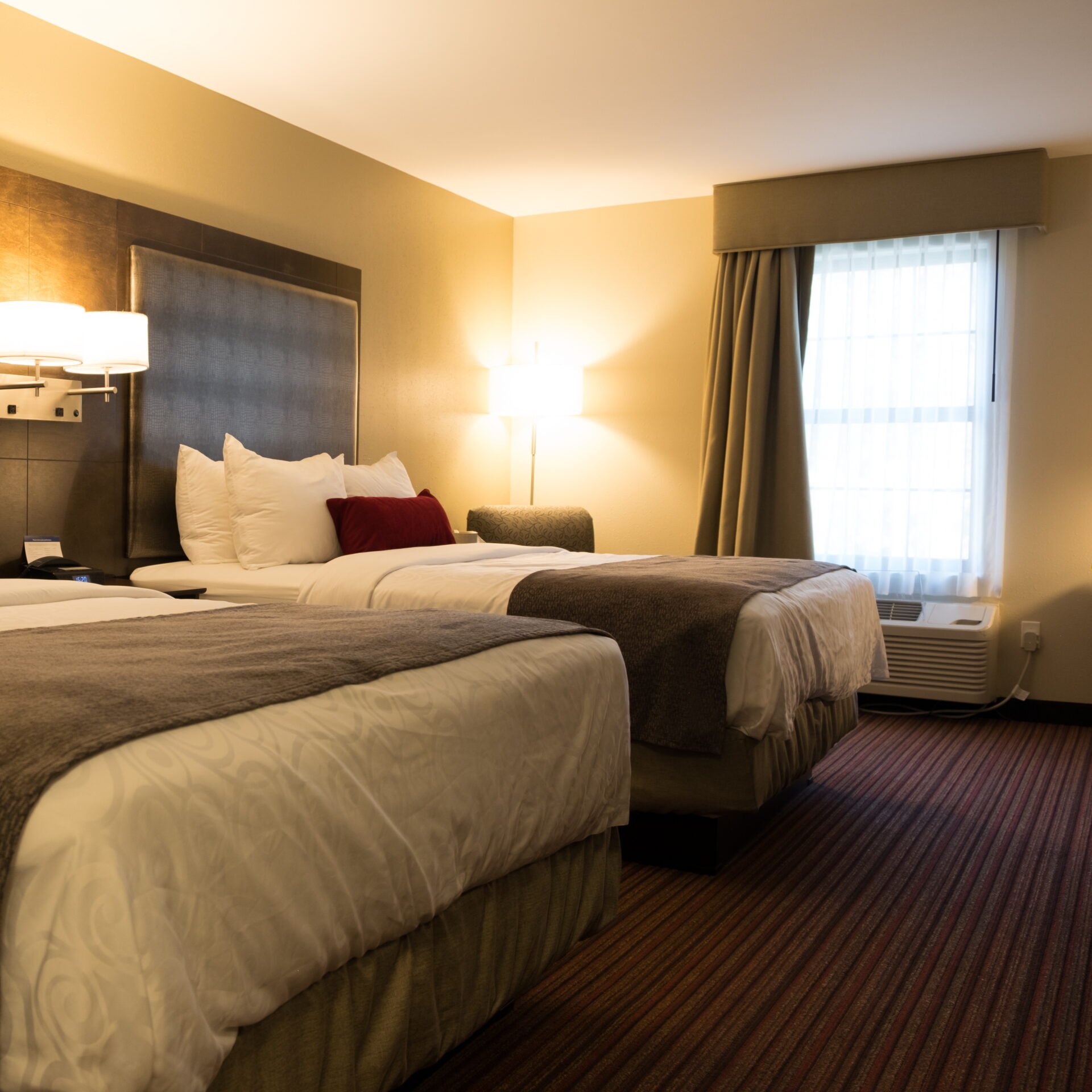 Interior view of a twin queen bed hotel room